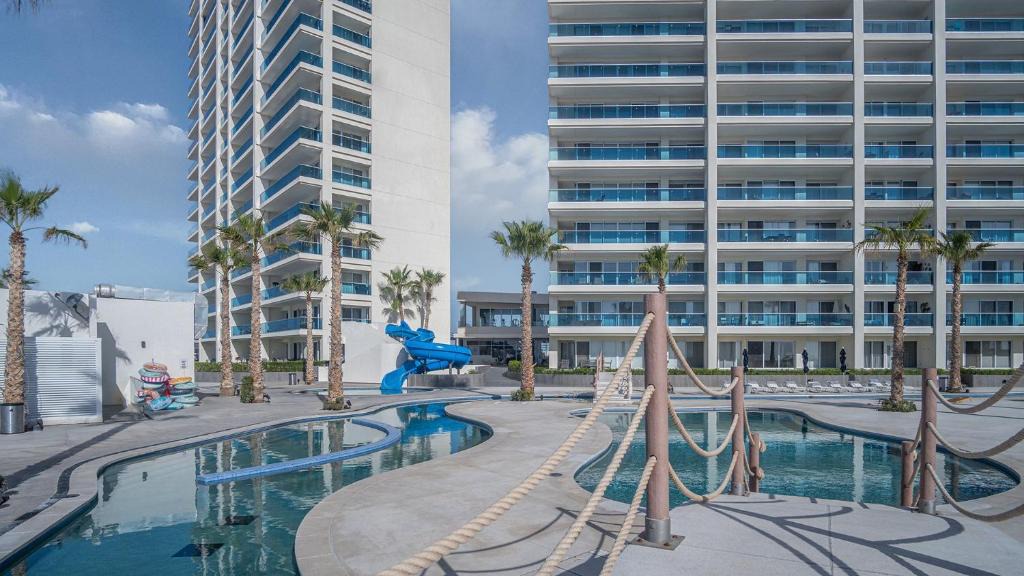 Backus House | Delightful 2 bedroom condo Encantame Towers Verano 705