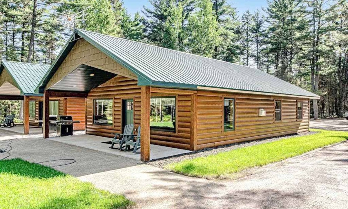 Conover House | Dog-friendly cabin with hot tub, fireplace, patio, grill, central AC, & W/D