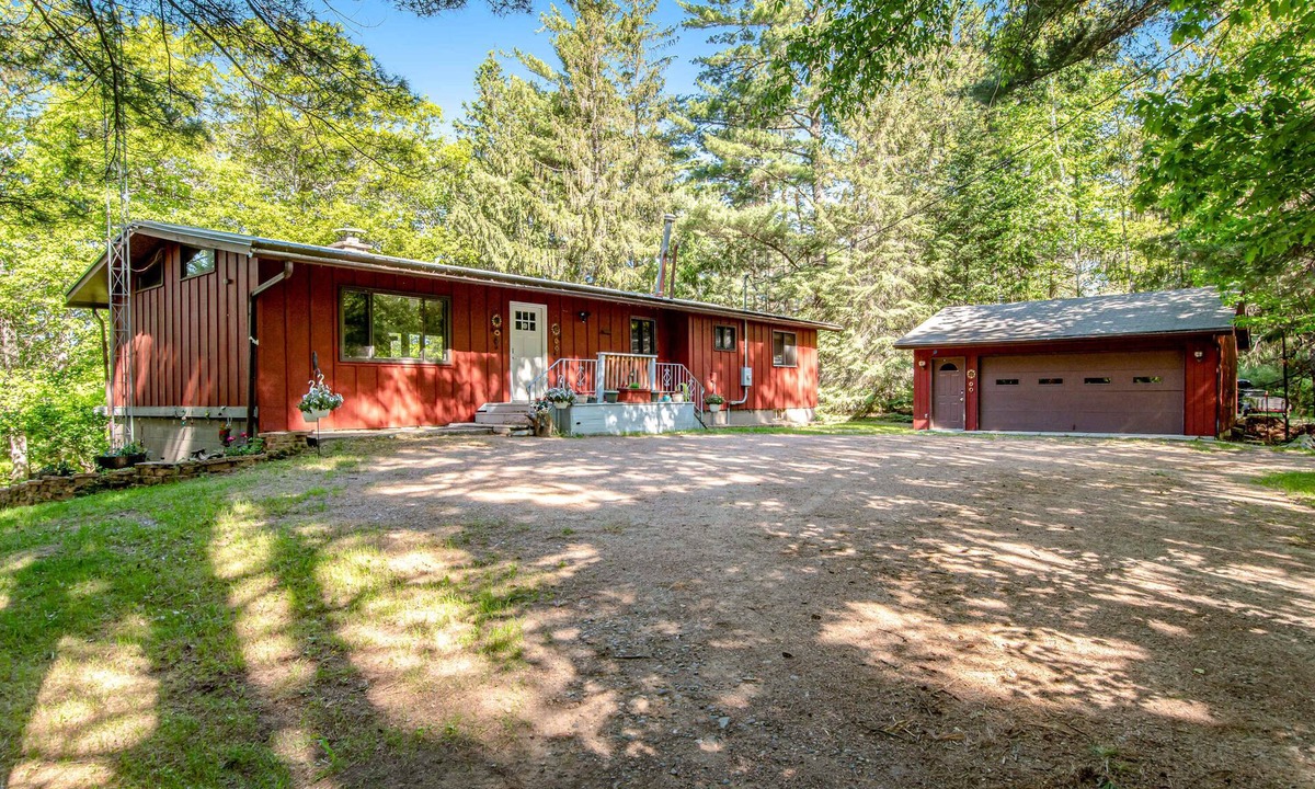 Manitowish Waters House | Dog-friendly, lakefront home with dock, kayaks, canoe, bike & fireplace