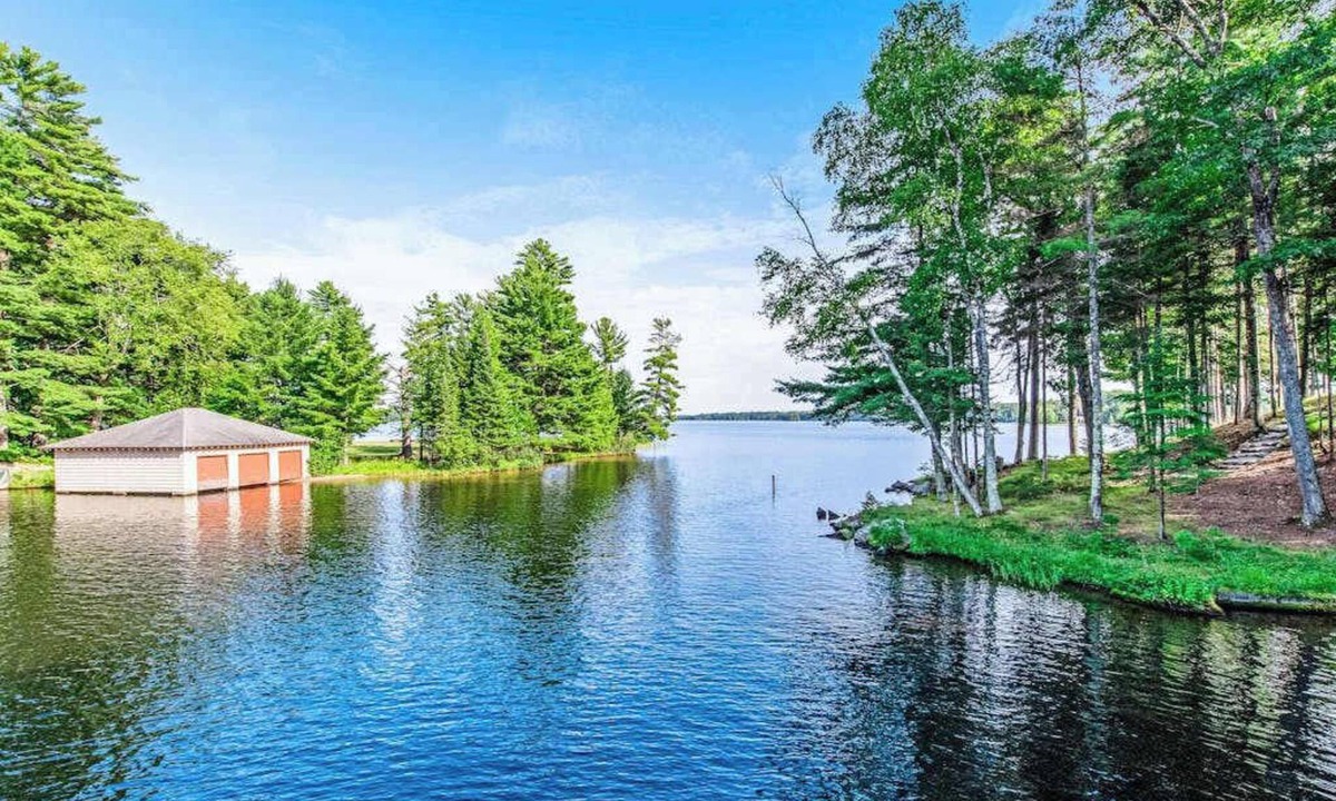 Manitowish Waters House | Dog-friendly, lakefront getaway w/a wraparound balcony, beach, & boat access