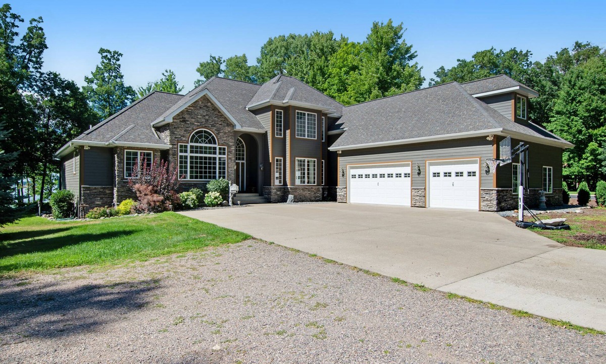 Arkdale House | Lakefront estate with firepit, grill, game room & sauna - near Sand Valley Golf