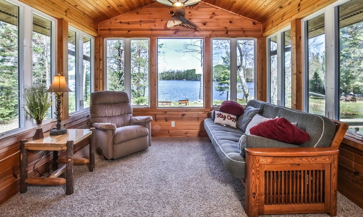 St Germain House | Level lakefront property with spacious cabin, private dock, and fire pit!