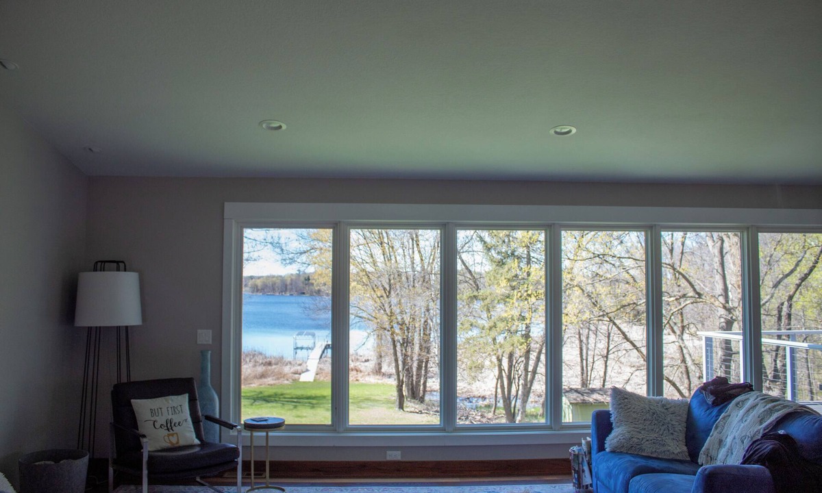 Aitkin House | Modern retreat on Cedar Lake- quiet wooded lot with beautiful lake view!