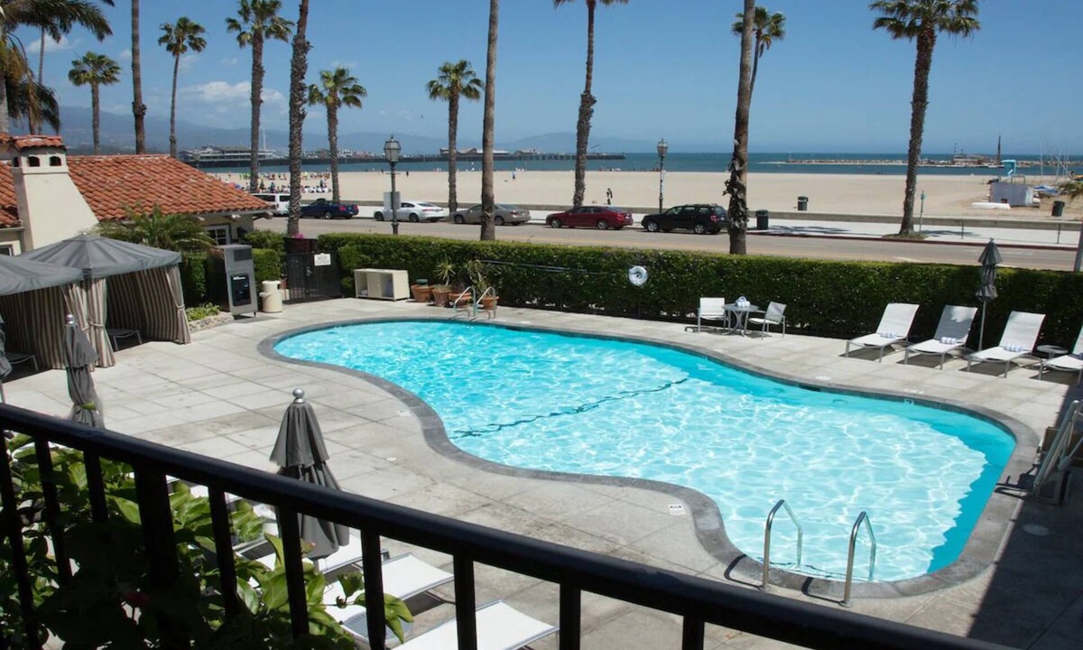 West Beach Hotel | Steps from the Beach! Relaxing Queen Stay w/Coastal Courtyards, Bikes & Pool!