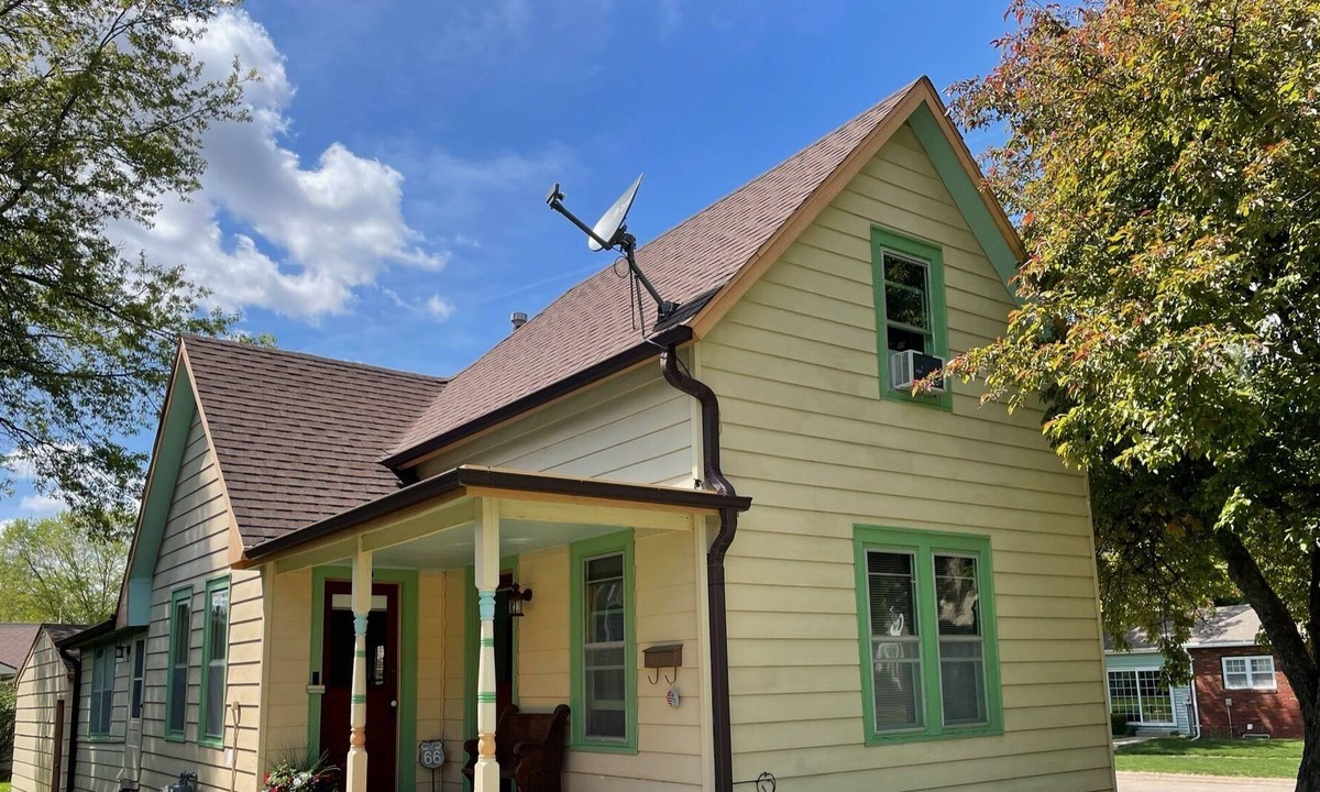 Pella House | Story and a half home less than a block from Pella's town square.