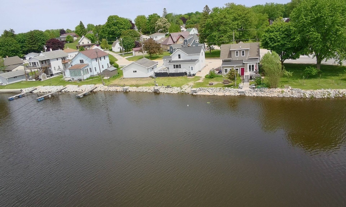 Algoma House | Waterfront 4-Bedroom Home on Ahnapee River with Boat Dock/Slip, Garage, WiFi