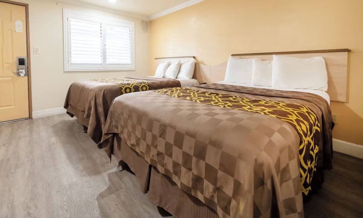 Corcoran Hotel | Welcoming Guest Room with Private Bath and Microwave, Perfect for Quick Escapes