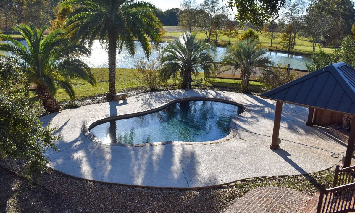 Youngsville House | Youngsville Retreat- pool, private pond, outdoor fireplace