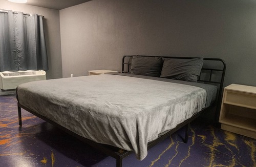 Jackson Apartment | 107 Gated King Bed Hotel Room