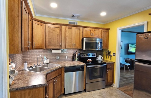 Aksarben - Elmwood Park House | 2-bedroom home w/deck, private backyard, and outdoor fireplace.