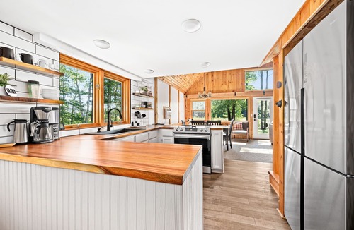 Hayward House | 2 cozy, secluded cabins on beautiful waterfront acreage with epic game room