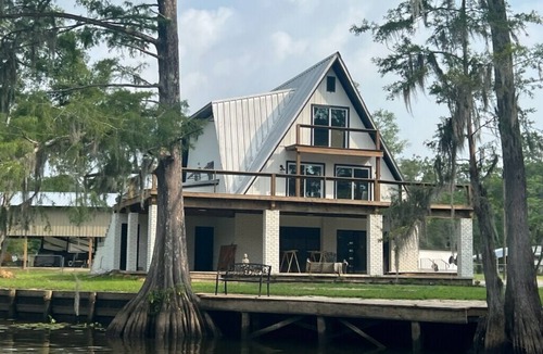 Maurepas House | 3 levels, 3 bed room spacious waterfront home is located in the Maurepas Swamp