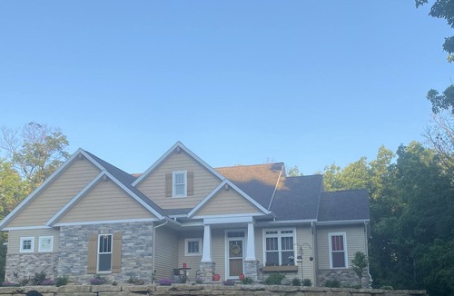 Pickett House | 4 bd. 2.5 bath 3200 sq. ft. house, 6 miles to EAA, in a private wooded lot!
