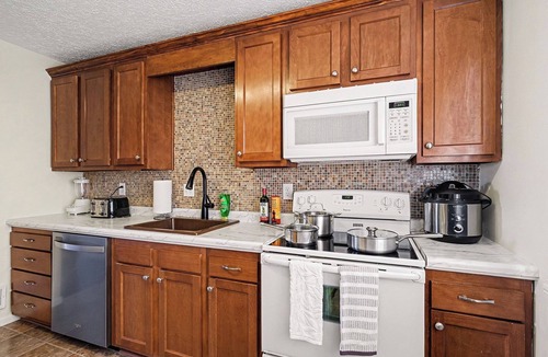 Southeast Omaha House | 4BR/2BA Omaha Home King Bed Deck, Grill & Game Room Near CWS/CHI