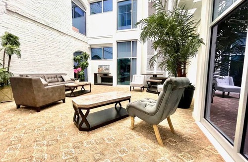 Downtown Omaha Apartment | A historic 900 square foot Atrium loft in the heart of the Old Market