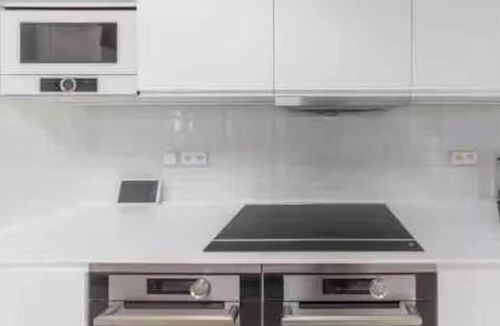 Quartier de la Place-Vendome Apartment | A MODERN HAUSSMANN SANCTUARY — LIGHT-FILLED, ELEGANT & UNMISTAKABLY PARISIAN