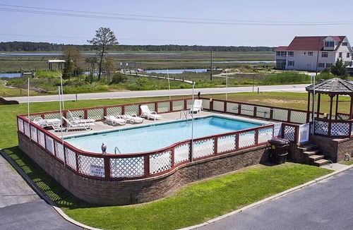Chincoteague House | Assateague Vista- Waterfront Views of Lighthouse, Pool, Shared Dock Access