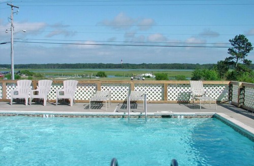 Chincoteague House | Assateague Vista- Waterfront Views of Lighthouse, Pool, Shared Dock Access