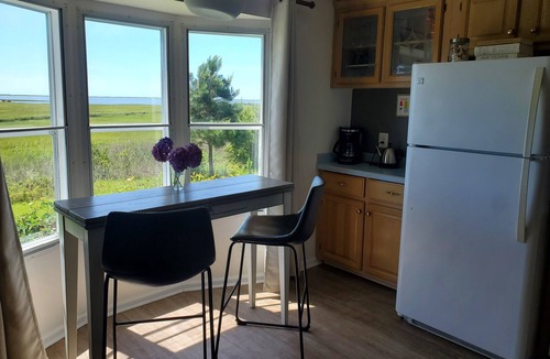 Assateague Pointe House | Bayfront cottage offers amazing views of the water and Assateague Island