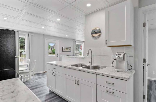 Two Rivers House | Beach Walk Home with Hot Tub and Fire Pit