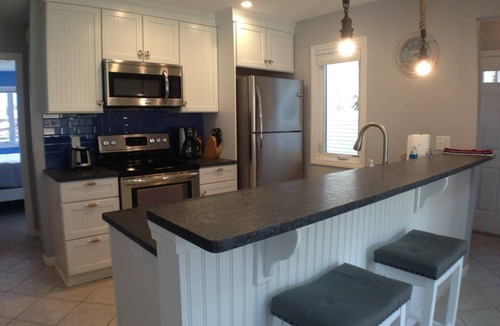 Brewster Condo | Beautifully Renovated Howland Village Townhouse with enclosed loft overlooking the Golf Course!