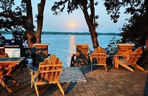Litchfield House | Belle Haven has 3 separate wood decks, one stone patio, a dock, & a beach house.