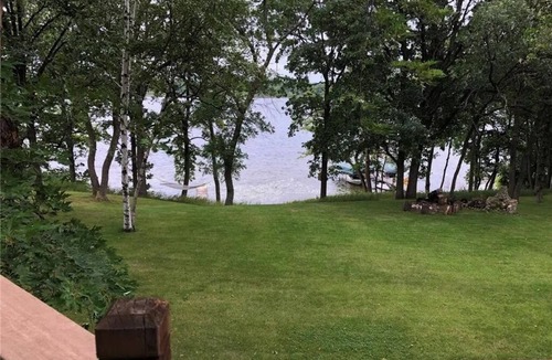 Detroit Lakes House | Bliss on the Bay-Hot Tub, Huge Deck, Fire Pit & Covered Outdoor Living Area