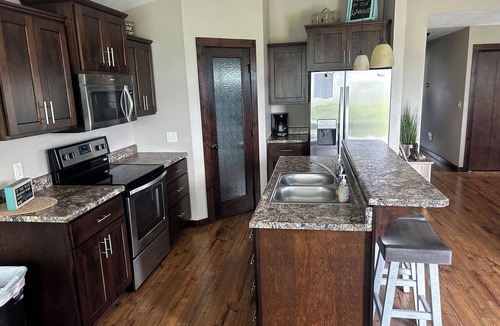 Spirit Lake Cabin | Book now, great rates!~3bedroom, 2bath~finished garage area.
