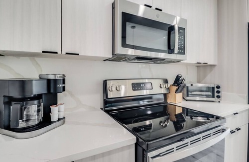Gulfport Condo | Brand New 1 Bedroom Condo-Luxurious Waterfront Pool-Sleeps 4