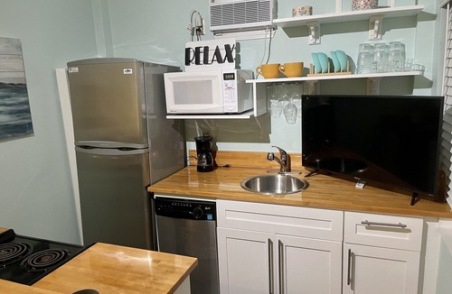 Perdido Key Coves One Apartment | Bungalow studio on the water w/Kayak, dock, private deck, tennis & pickle ball!