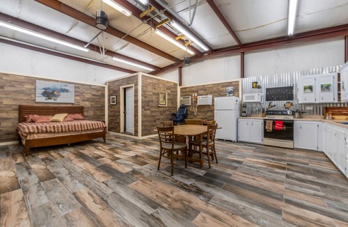 Butte La Rose House | Cajun rustic industrial studio style