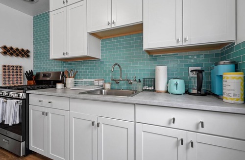 Pierpont Bay Apartment | Calypso Breeze, Hot Tub, Fire Pit, Games, 2 King Bed, 1 Minute Walk to the Beach