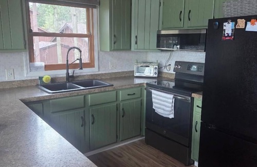 Wild Rose House | Charming 3-bedroom lake house on tranquil Wilson Lake near Wild Rose, WI