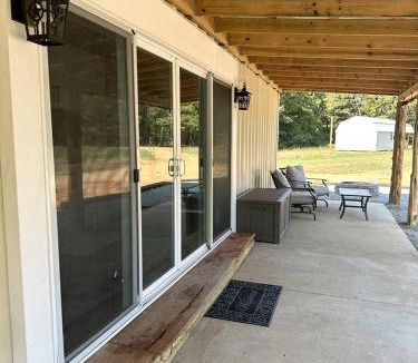 Sardis House | Charming Container Home with Hot Tub near Sardis Lake, Perfect for a Romantic Glamping Getaway