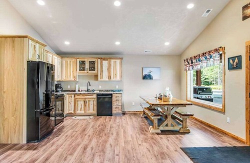Conover House | Charming dog-friendly cabin with hot tub, fireplace, patio, grill, & central AC