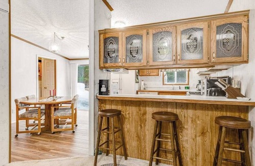 Boulder Junction House | Charming home with gas grill, full kitchen, deck, patio, TV, and washer/dryer