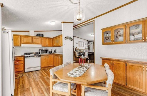 Boulder Junction House | Charming home with gas grill, full kitchen, deck, patio, TV, and washer/dryer