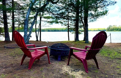 Mercer Cabin | Charming Lakefront Cabin. 100 ft private beach with dock on Lake of the Falls.