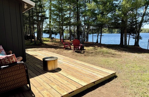 Mercer Cabin | Charming Lakefront Cabin. 100 ft private beach with dock on Lake of the Falls.
