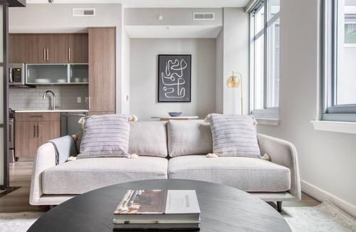 Buzzard Point Apartment | Chic Navy Yard 1BR w/W/D, Roof BBQ & Gym, near Nats Park, by Blueground