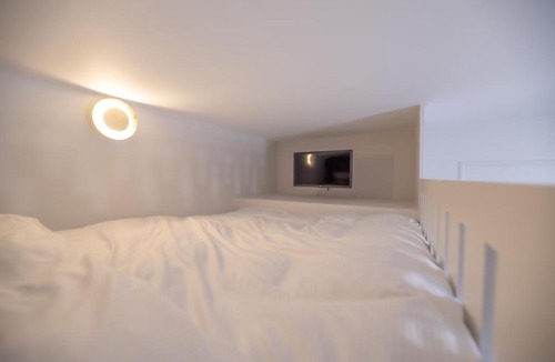 Ternes Apartment | CIA - Mezzanine Studio by Arc de Triomphe
