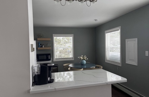 South Range Apartment | Close to trail 2-bedroom unit in South Range for your next getaway.