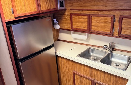 Bear Boat Rental | Come stay on our 40 Viking yacht - two bedrooms with restaurant and biking trail