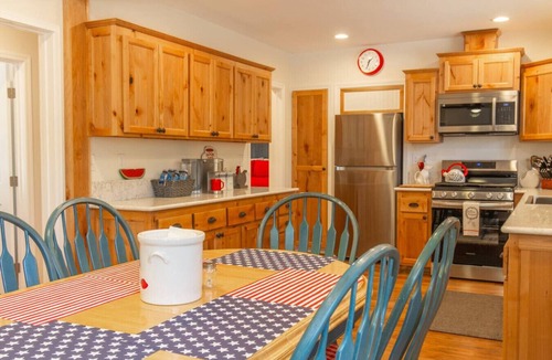 Camarillo House | Comfy Red Farmhouse gives you Rest and Relaxation