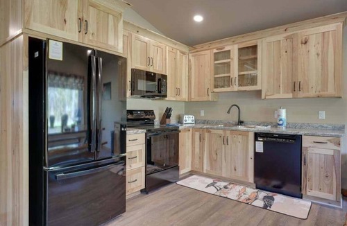Conover House | Contemporary dog-friendly cabins with hot tub, fireplaces, patios, & game room