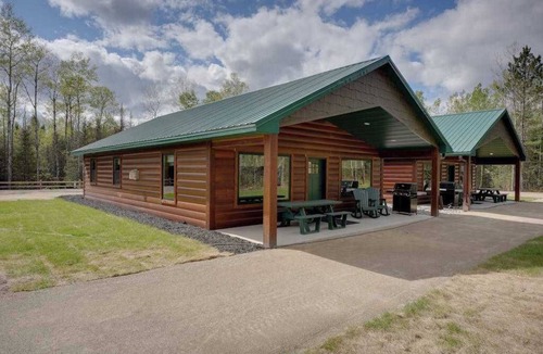 Conover House | Contemporary dog-friendly cabins with hot tub, fireplaces, patios, & game room