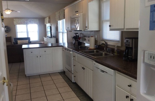 Fort Morgan House | Conveniently located between beach & community pools, tennis court; dog friendly