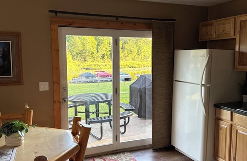 Side Lake Cabin | Cozy 2-bedroom cabin in tranquil Side Lake. On the water, dock space available.