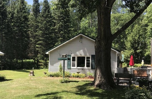 Northwoods Beach Cabin | Cozy Cabin - Lac Courte Oreilles Lake - Private Dock & Lake Access