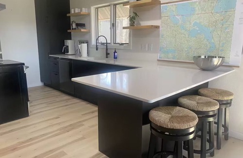 Remer House | Cozy Lakefront Cabin, Hot Tub, Game Room, & Stunning Views